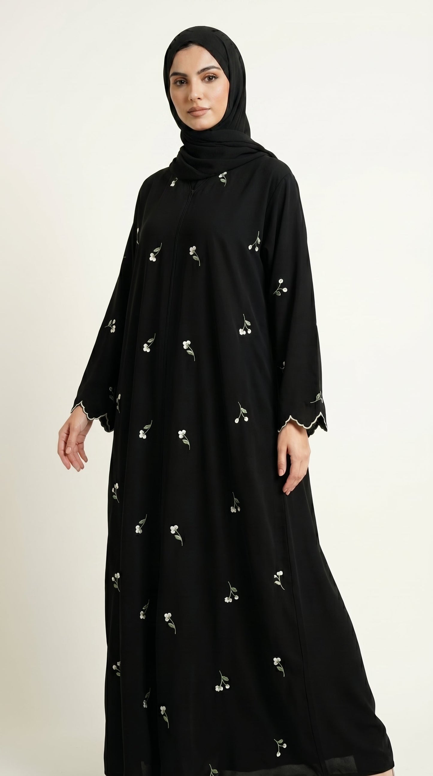 Black Closed Abaya with Dainty Floral Embroidery  Aromique